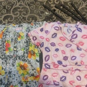 Lot of 2 Koi scrub tops size xs.